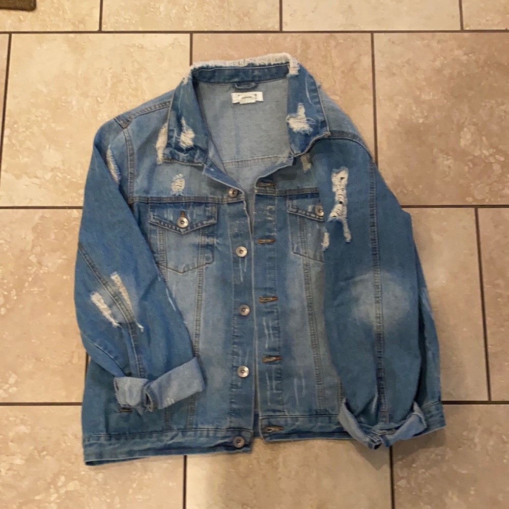 Distressed jean jacket